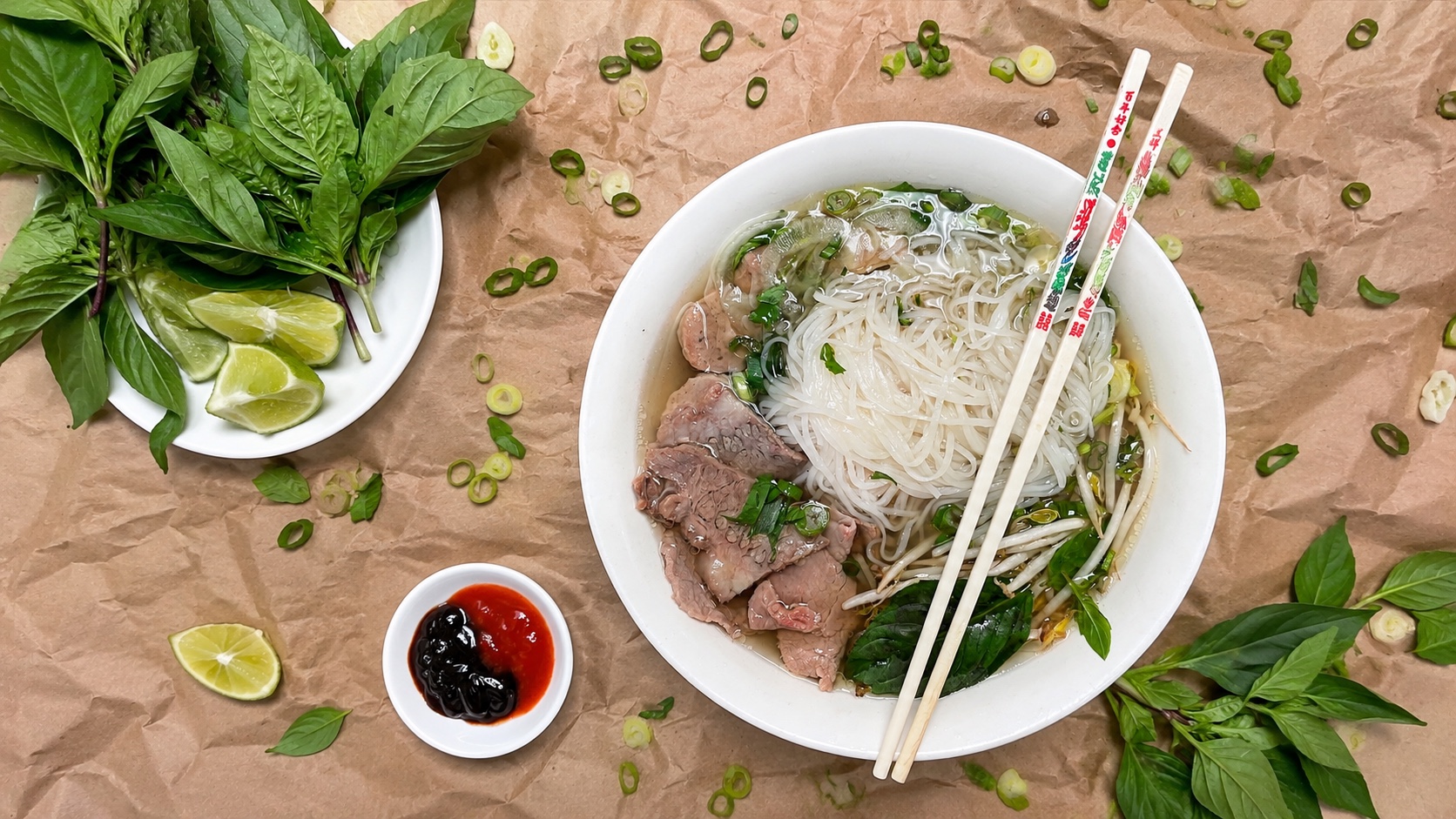 Bowl of pho with fresh herbs at Vietnamese Noodle House